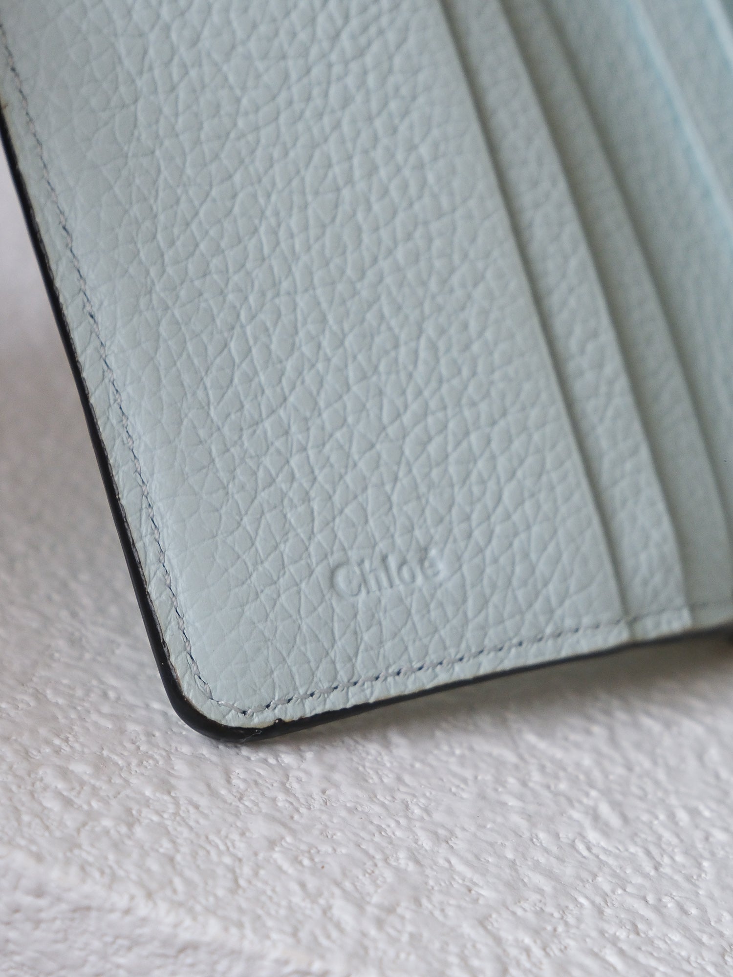 'Alphabet' Grained Leather Tri-fold Wallet
